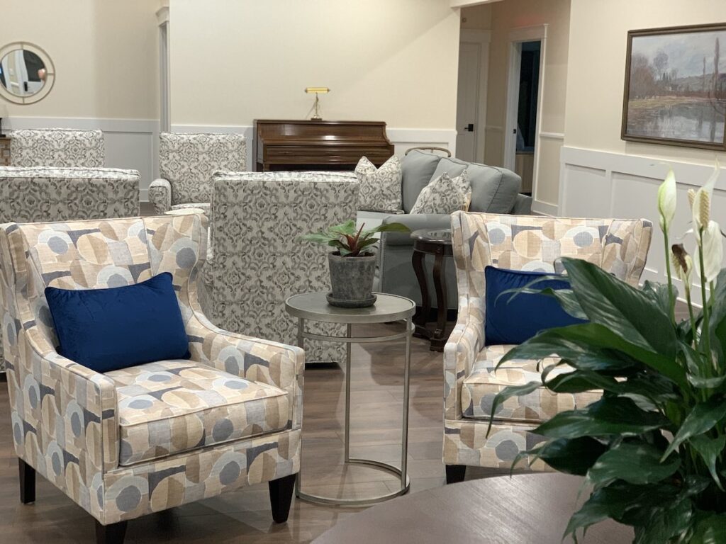 Glen Haven Huntersville assisted living great room custom chairs luxury furniture interior design