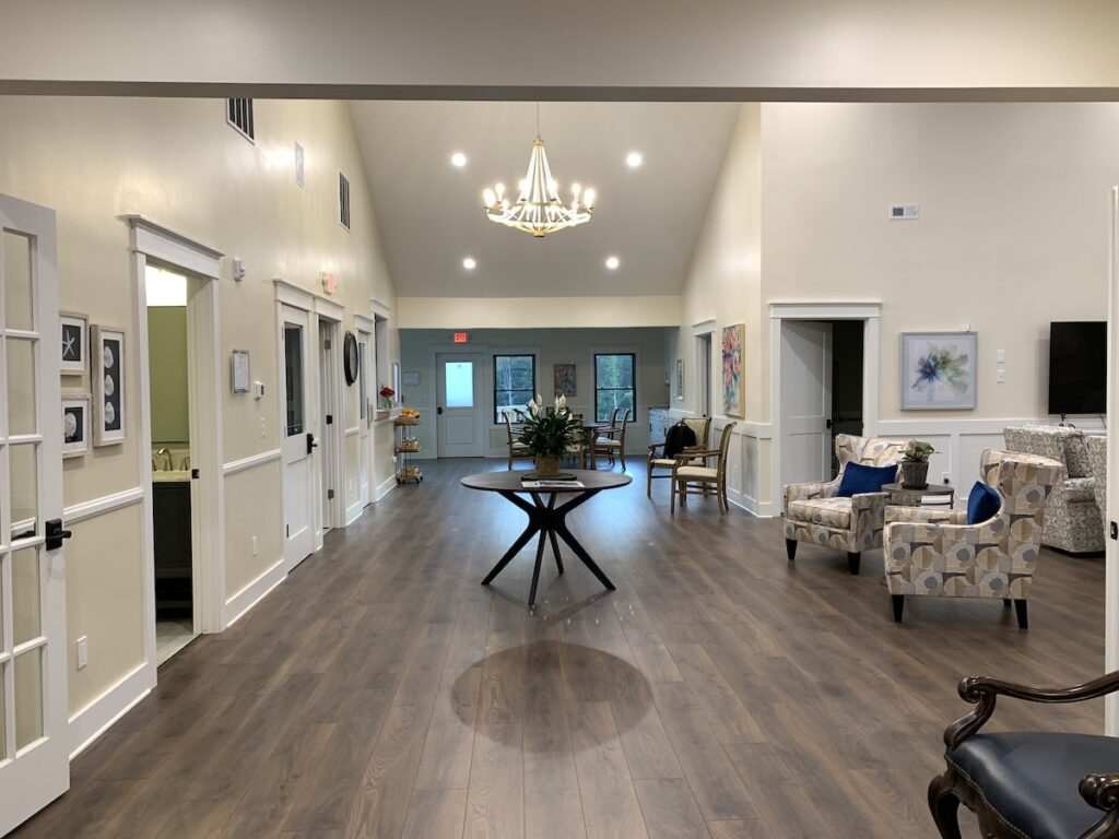 Glen Haven Huntersville assisted living main hallway chandelier central table 5000 square feet spacious